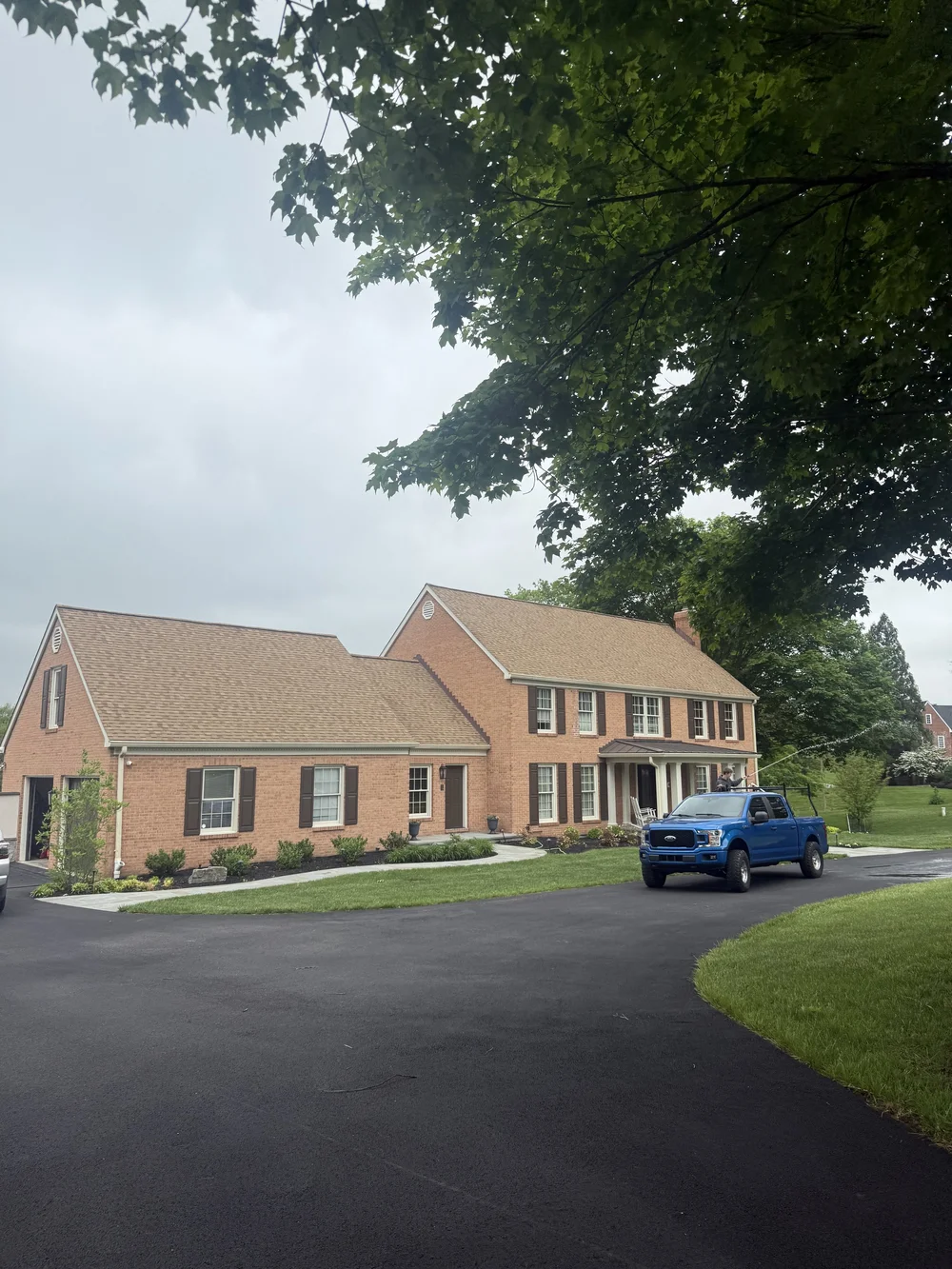 Brick home exterior freshly cleaned by B&B Pressure Wash